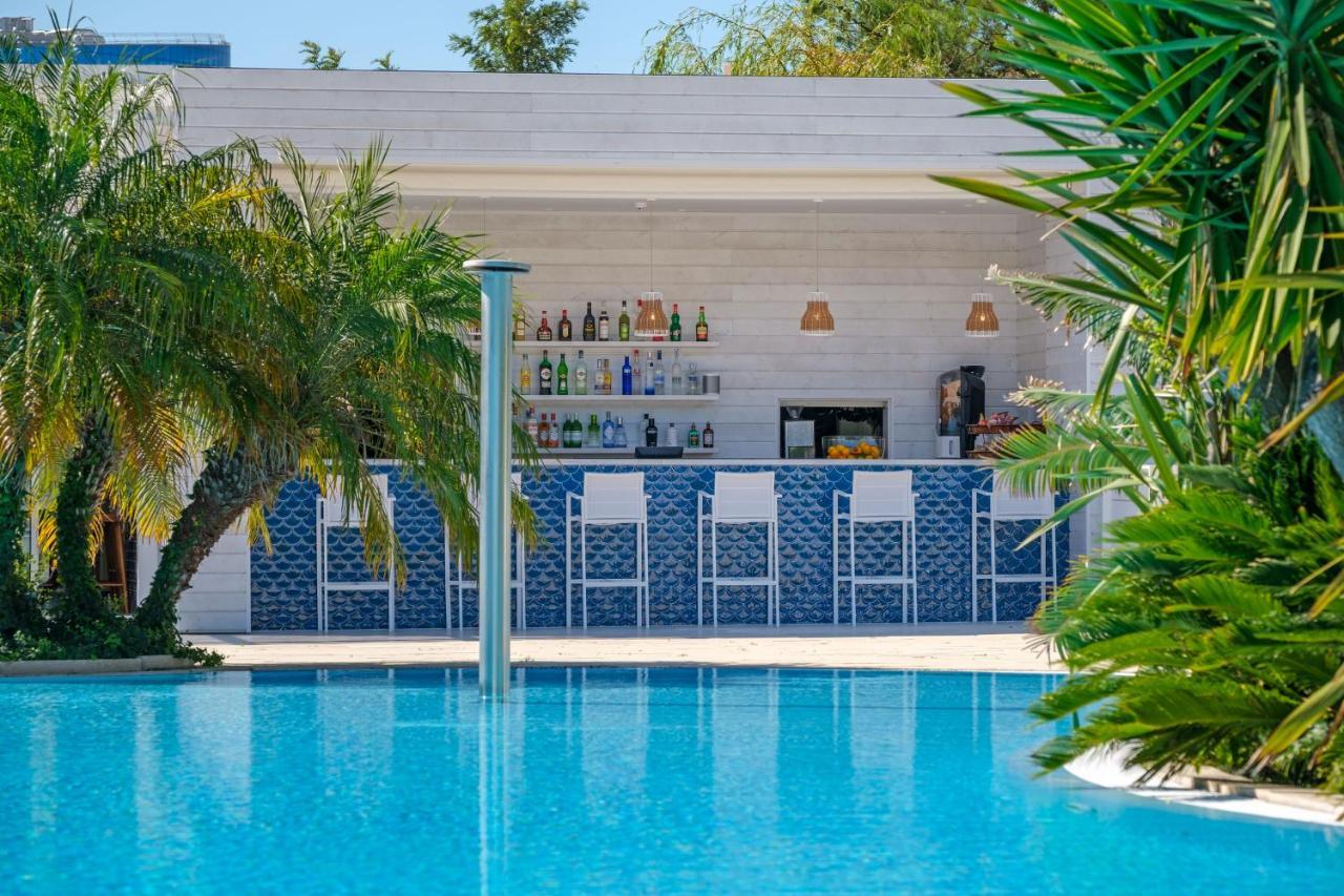 มาลิบู ฟอซ โฮเต็ล แอนด์ เรสเทอรองต์ Hotel ฟิเกราดาฟอซ ภายนอก รูปภาพ The swimming pool at the hotel